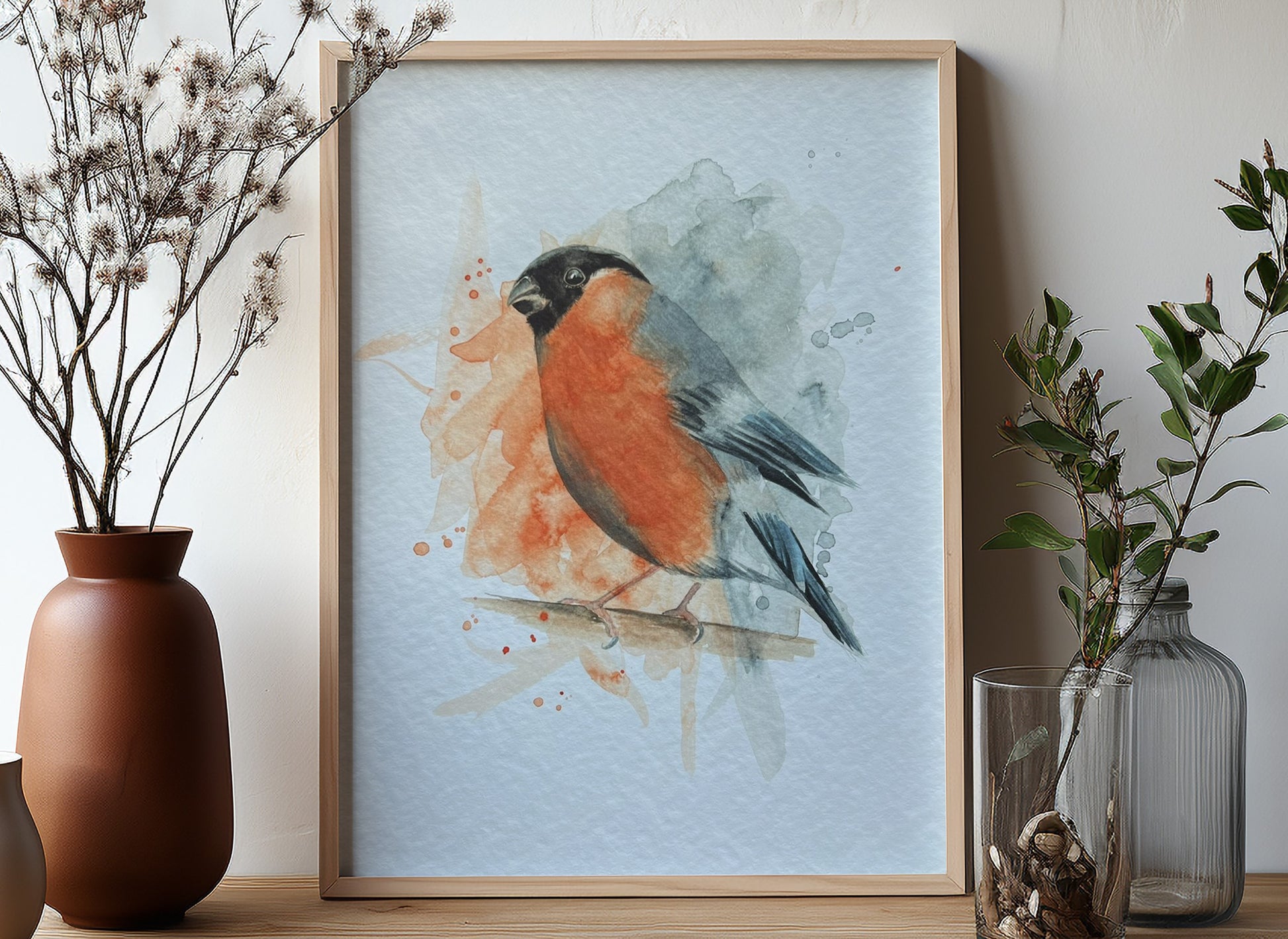 An A4 print of a bullfinch on textured archival paper.