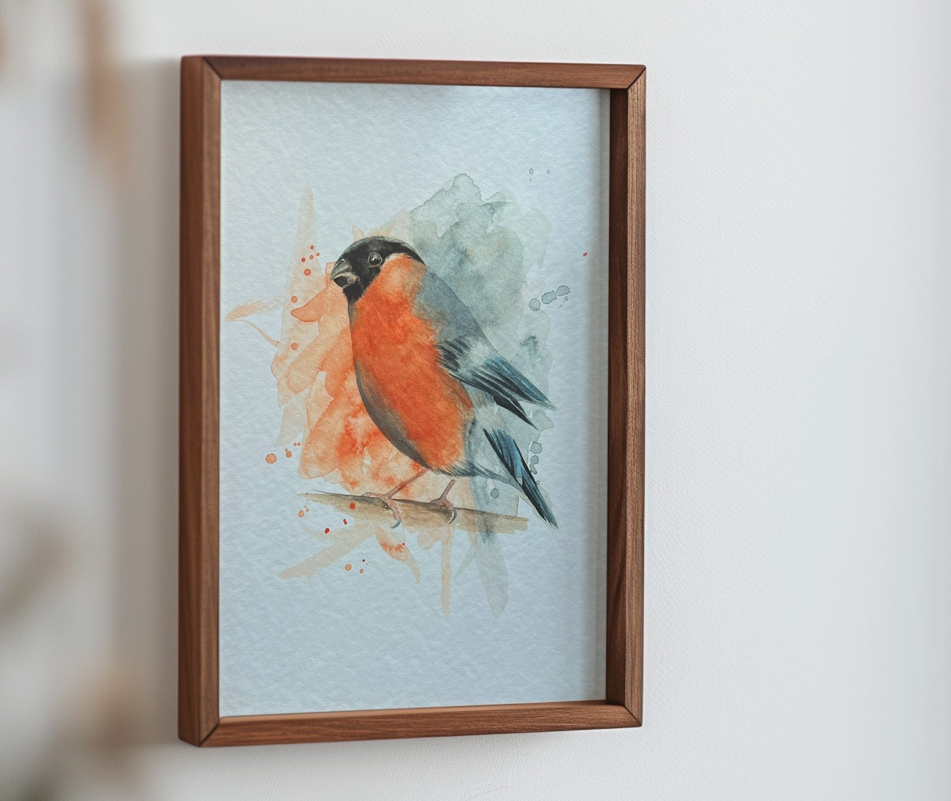 An A4 print of a bullfinch on textured archival paper.