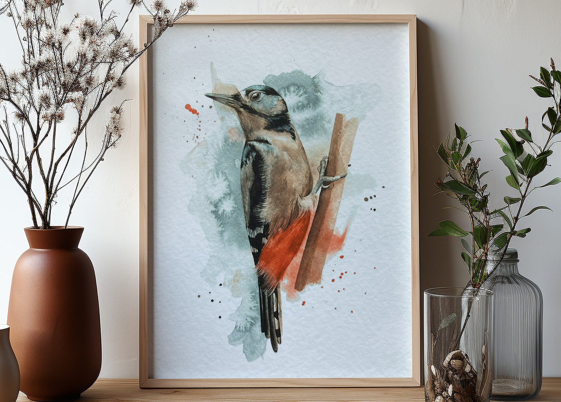 An A4 print of a great spotted woodpecker on textured archival paper.