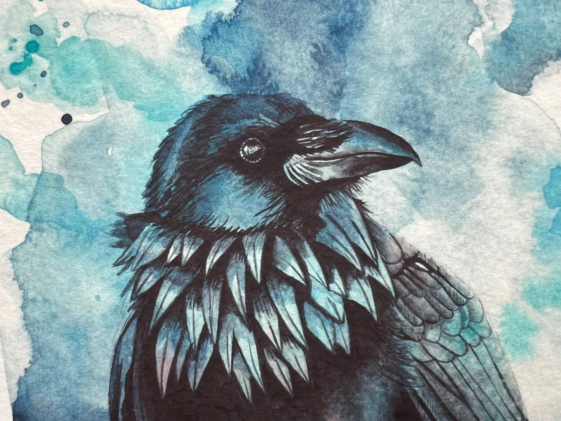 A watercolour print of a raven