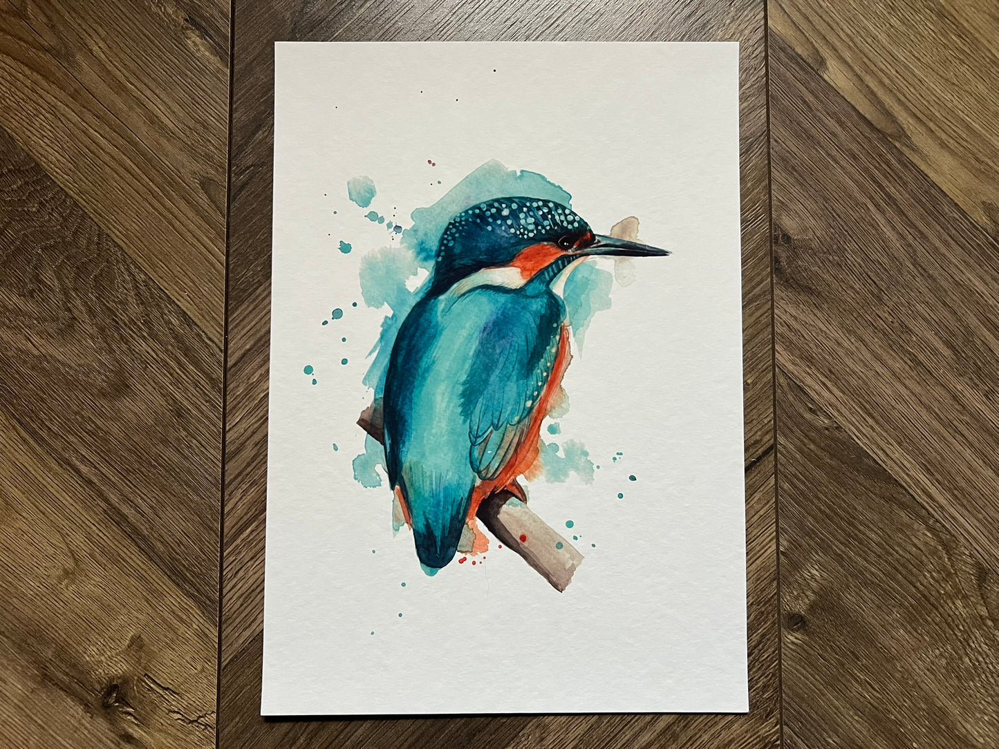 A watercolour print of an expressively painted kingfisher from forest farm in Cardiff