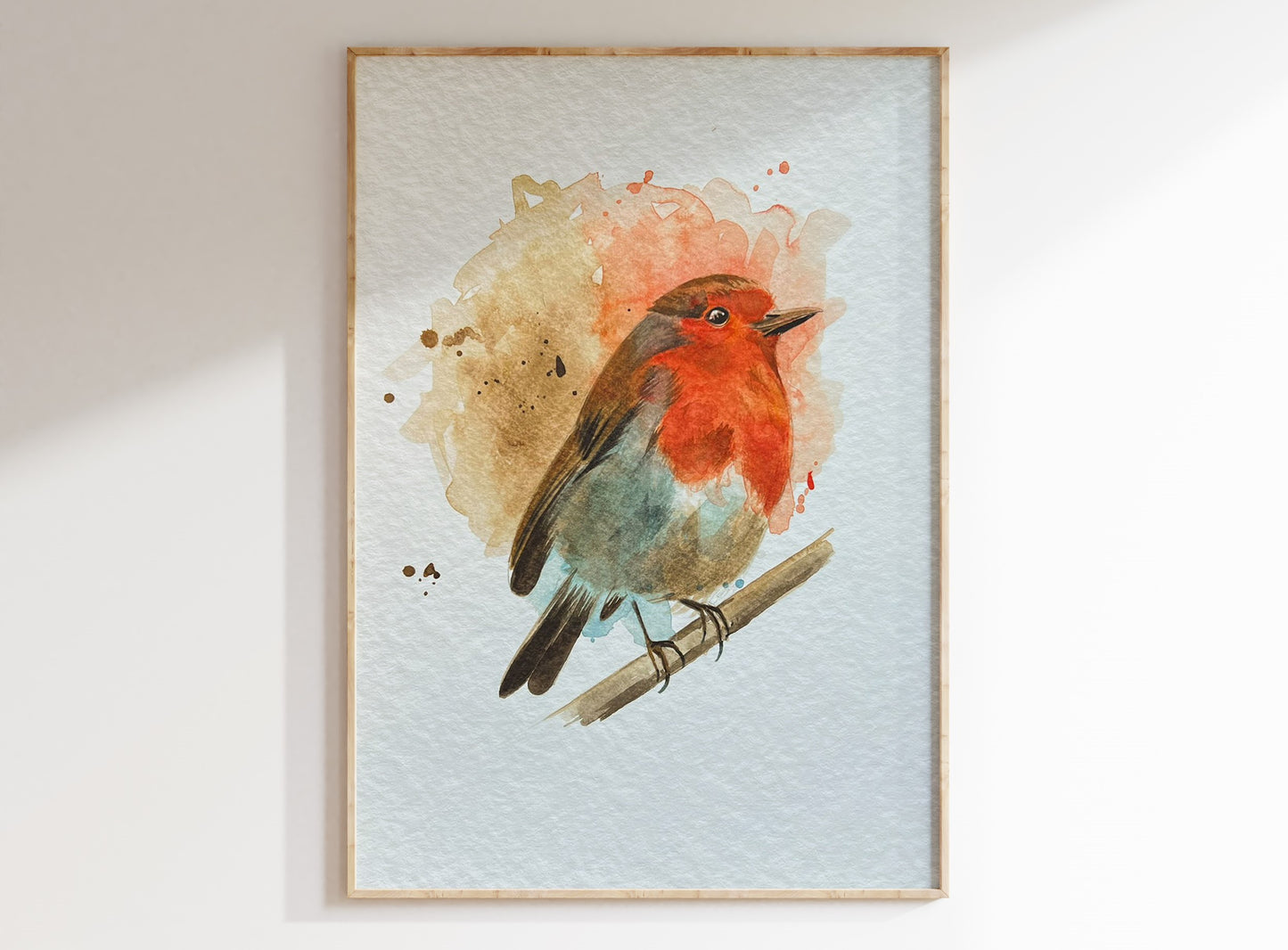 An A4 print of a robin on textured archival paper.