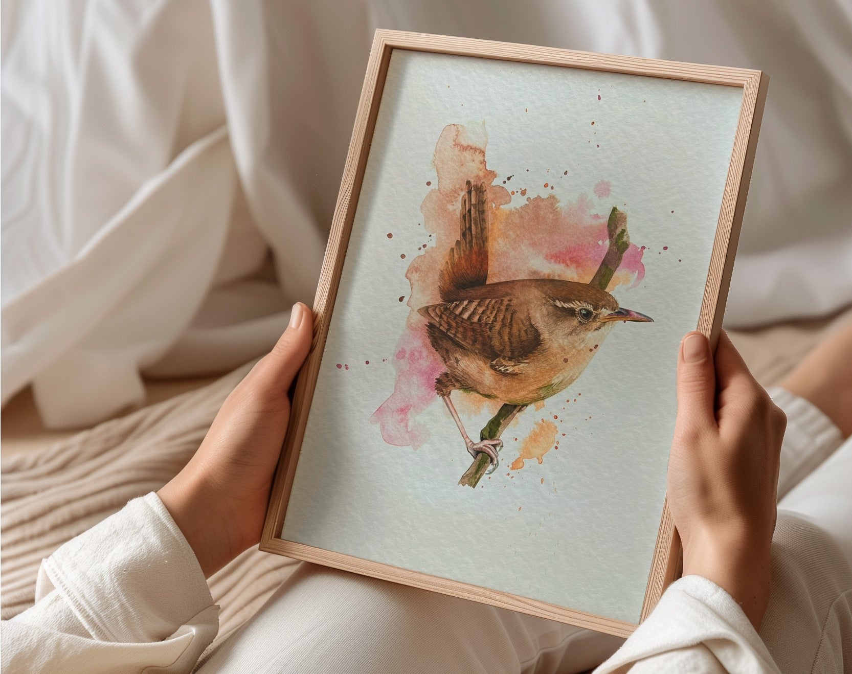 An A4 print of a wren on textured archival paper.