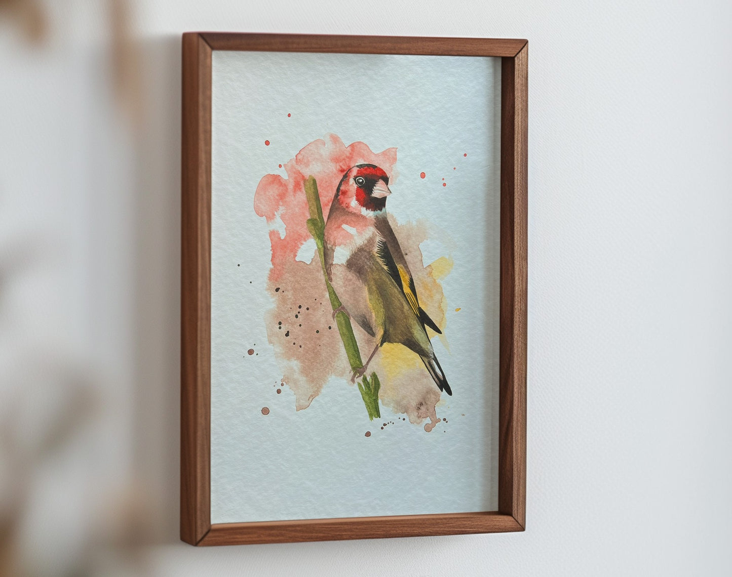 An A4 print of a goldfinch on textured archival paper.