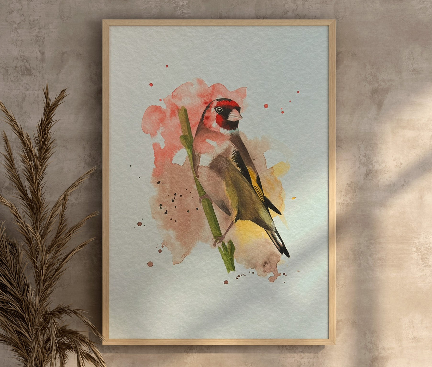 An A4 print of a goldfinch on textured archival paper.