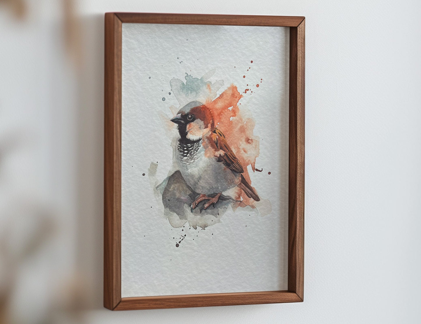 An A4 print of a watercolour house sparrow painted in an expressive style. It's printed on textured archival paper and displayed in a wooden frame.