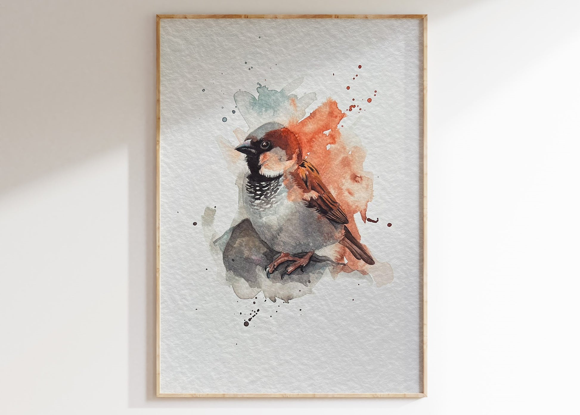 An A4 print of a watercolour house sparrow painted in an expressive style. It's printed on textured archival paper and displayed in a wooden frame.